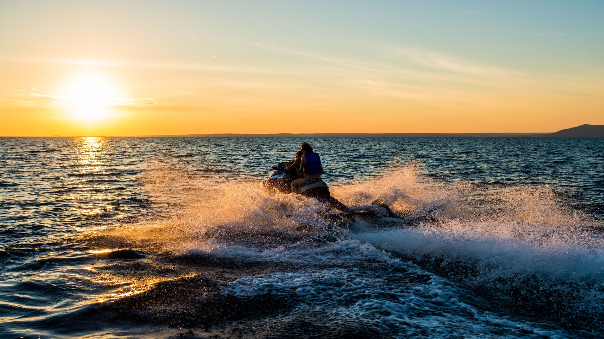 People Having Fun Riding A Jet Boat